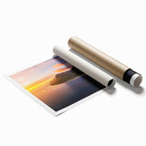 Vibrant landscape print showcasing dramatic cliffs and rolling hills, expertly rolled for easy transport, ideal for home decor or art collection.