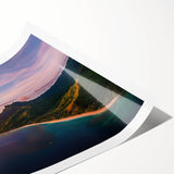 Vibrant rolled landscape print depicting dramatic cliffs and serene ocean waves, showcasing rich colors and textures, ideal for wall decor or art collection.