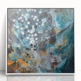 Framed acrylic artwork showcasing vibrant abstract splatters in a modern design, featuring a white frame and colorful patterns ideal for contemporary decor.