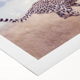 Colorful rolled canvas showcasing a vibrant design of various animals in an artistic, abstract style, carefully packaged in a protective tube for safe shipping.