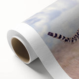 Rolled canvas showcasing a vibrant African wildlife design, featuring intricate animal illustrations in rich colors, packaged securely in a durable cardboard tube for safe shipping. Perfect for enhancing home decor with a touch of nature-inspired art.