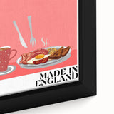 Close-up of a black framed canvas featuring colorful, textured depictions of various food dishes.