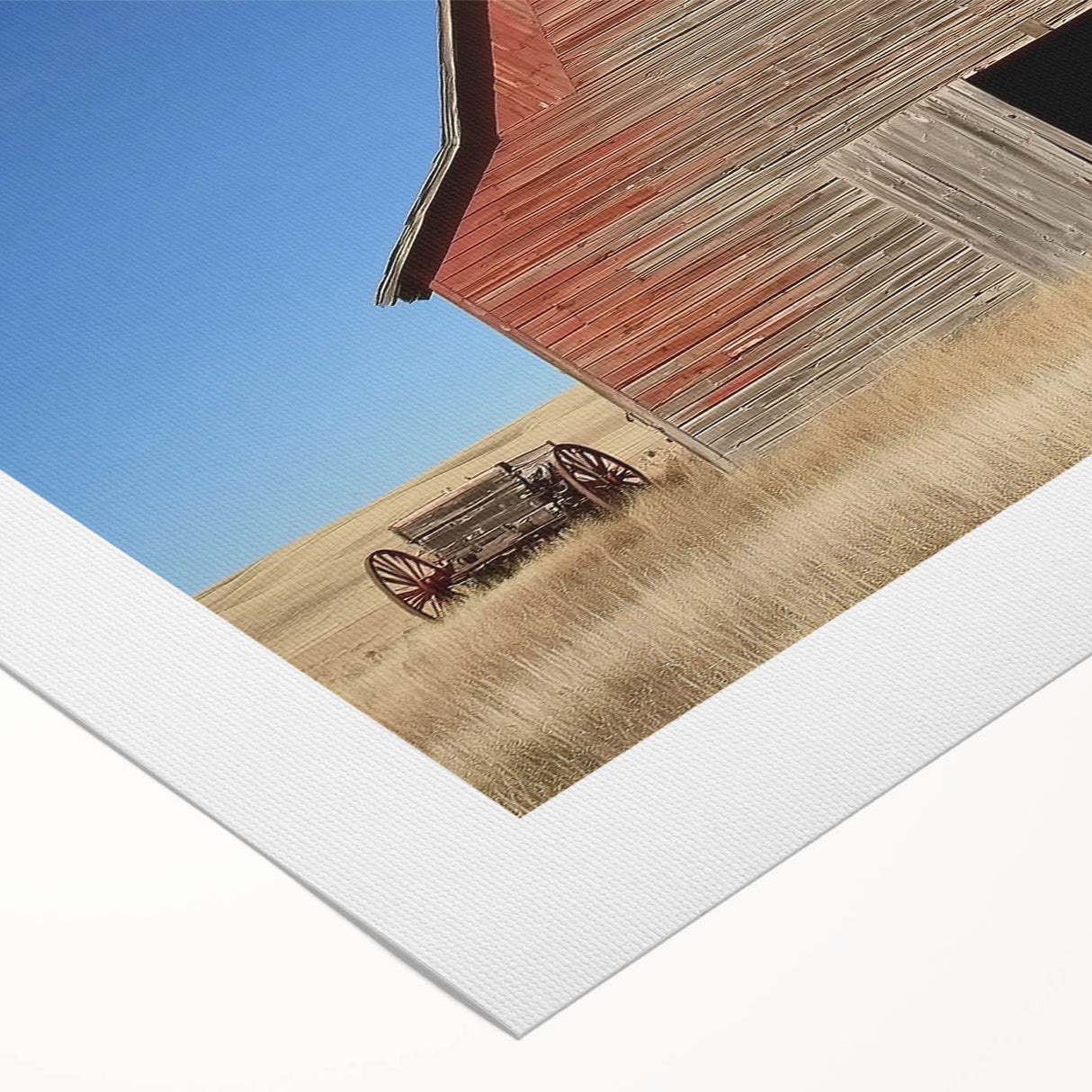 Rolled canvas artwork depicting a serene landscape with a rustic barn surrounded by lush greenery, packaged securely in a durable cardboard tube for safe delivery.