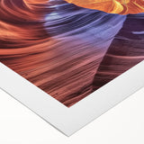 Vibrant landscape canvas print showcasing colorful canyons in rich earthy tones, rolled for easy transport and display, perfect for enhancing home decor.