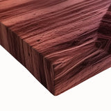 Close-up view of a stretched canvas artwork depicting vibrant canyons in a landscape design, showcasing rich colors and textures, perfect for home decor.