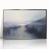 Framed acrylic print showcasing a serene countryside landscape with vibrant green fields and rolling hills, accented by a silver frame for a modern touch.