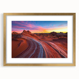 Desert landscape artwork framed in an elegant gold mat, showcasing warm hues of orange and beige, ideal for enhancing home decor with a touch of nature.
