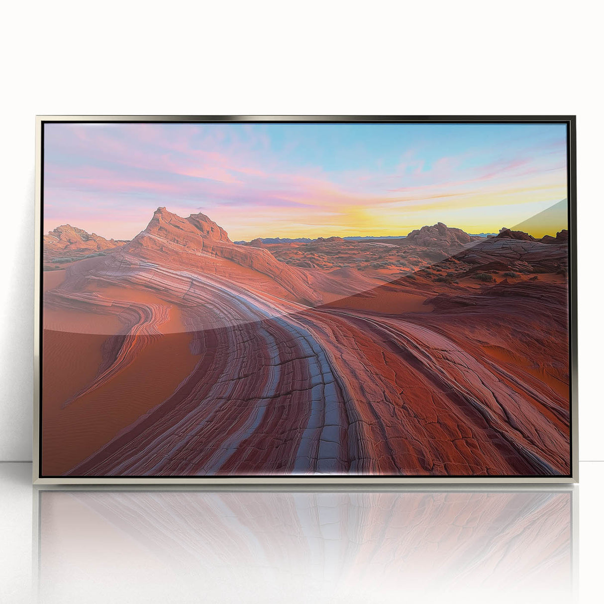 Framed acrylic artwork depicting a vibrant desert landscape, featuring warm hues of orange and yellow, elegantly displayed in a sleek silver frame, ideal for modern decor.