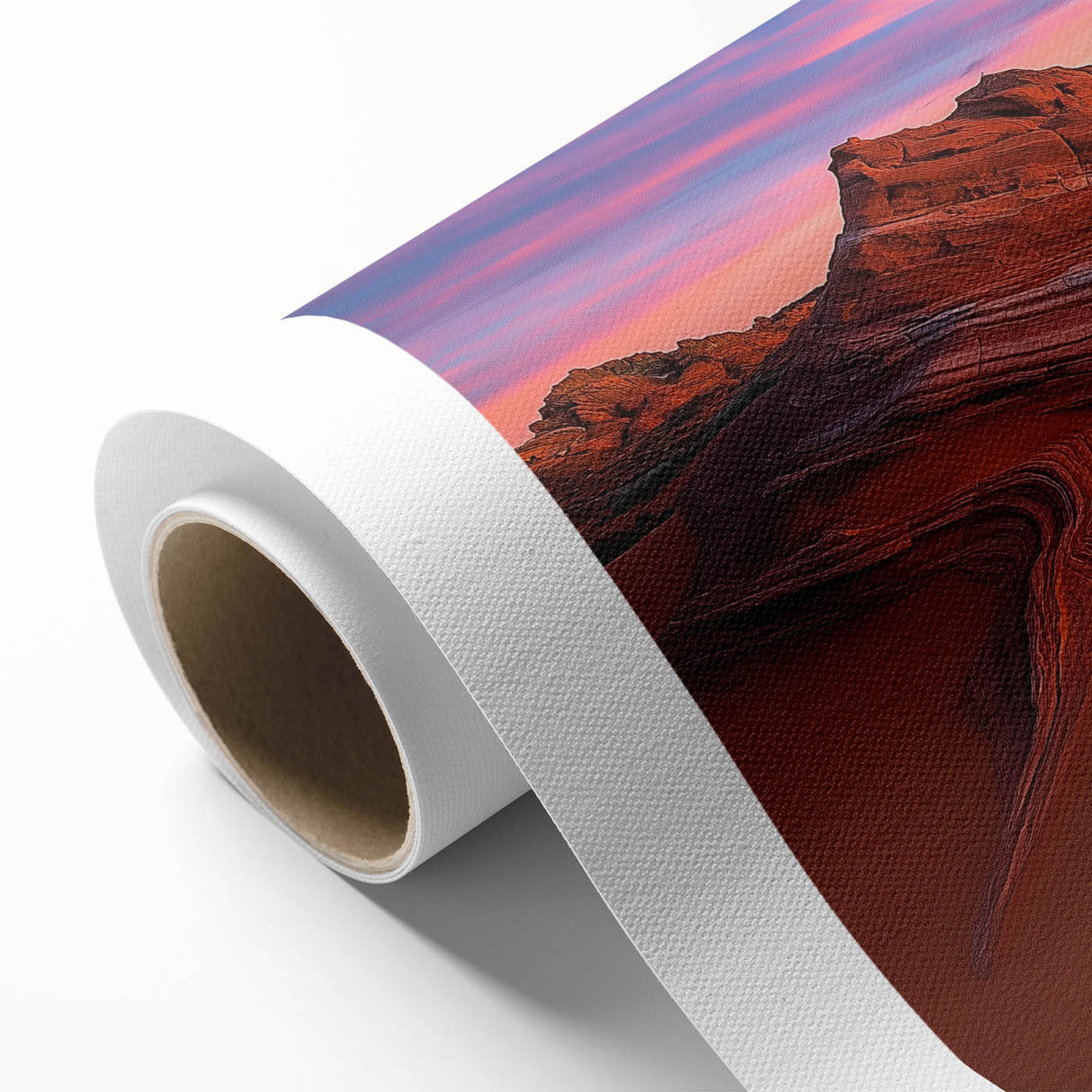 Vibrant desert landscape rolled canvas artwork showcasing warm hues of orange and yellow with detailed mountain silhouettes, elegantly packaged for display.