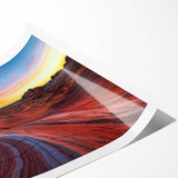 Desert landscape rolled print showcasing vibrant orange and yellow hues, depicting an expansive sandy dune scene under a clear blue sky, ideal for home décor.