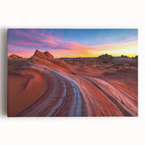Stretched canvas artwork depicting a serene desert landscape with vibrant orange and yellow hues at sunset, ideal for home decor and art enthusiasts.
