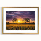Elegant gold-framed landscape print showcasing vibrant green fields under a clear blue sky, perfect for adding a touch of nature-inspired decor to any room.