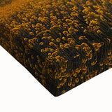 Close-up of a stretched canvas artwork depicting serene landscapes and fields in vibrant green and golden hues, showcasing intricate brushwork and texture, perfect for home decor.