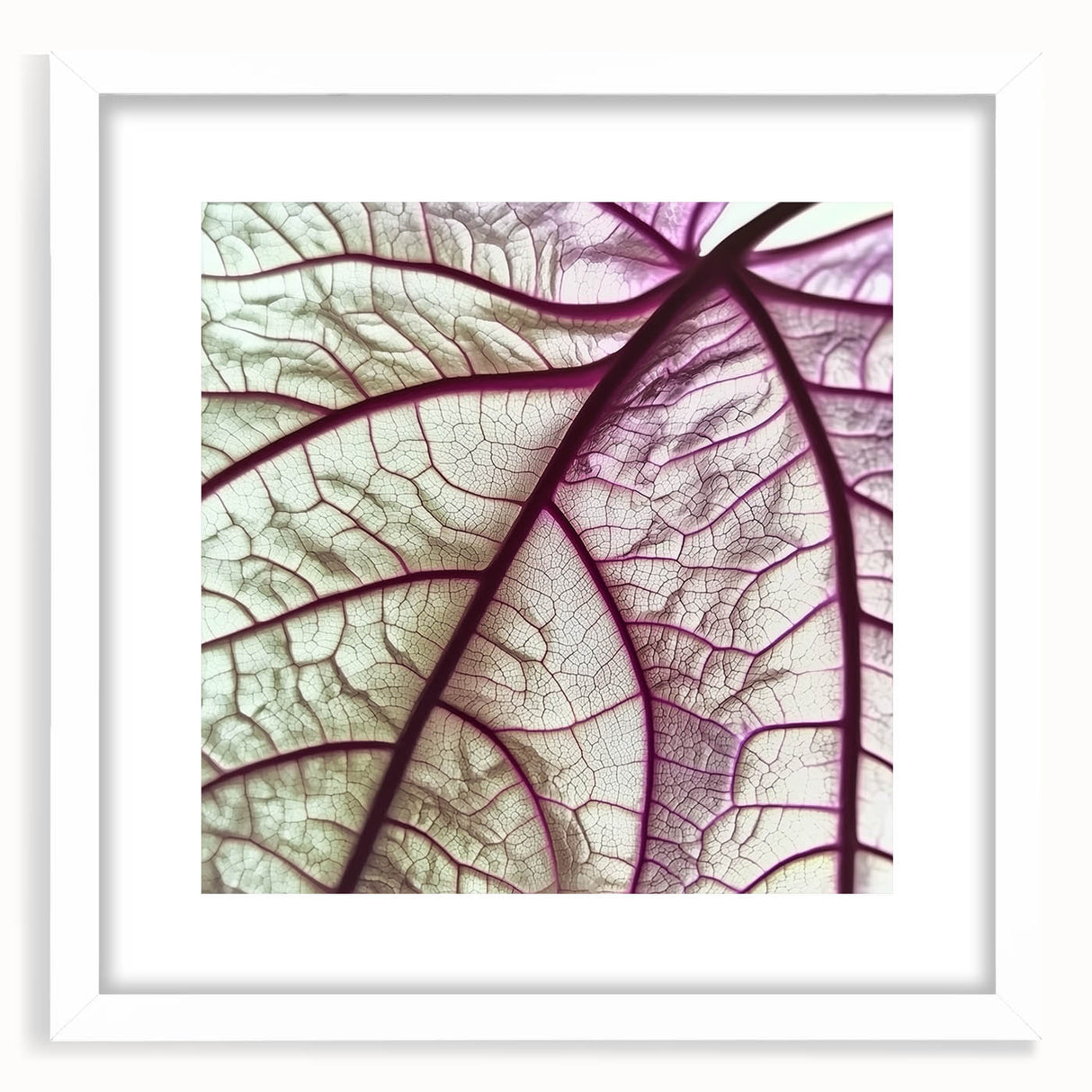 Abstract art print featuring close-up of green leaves in a white frame, suitable for bedroom or dining room decor.