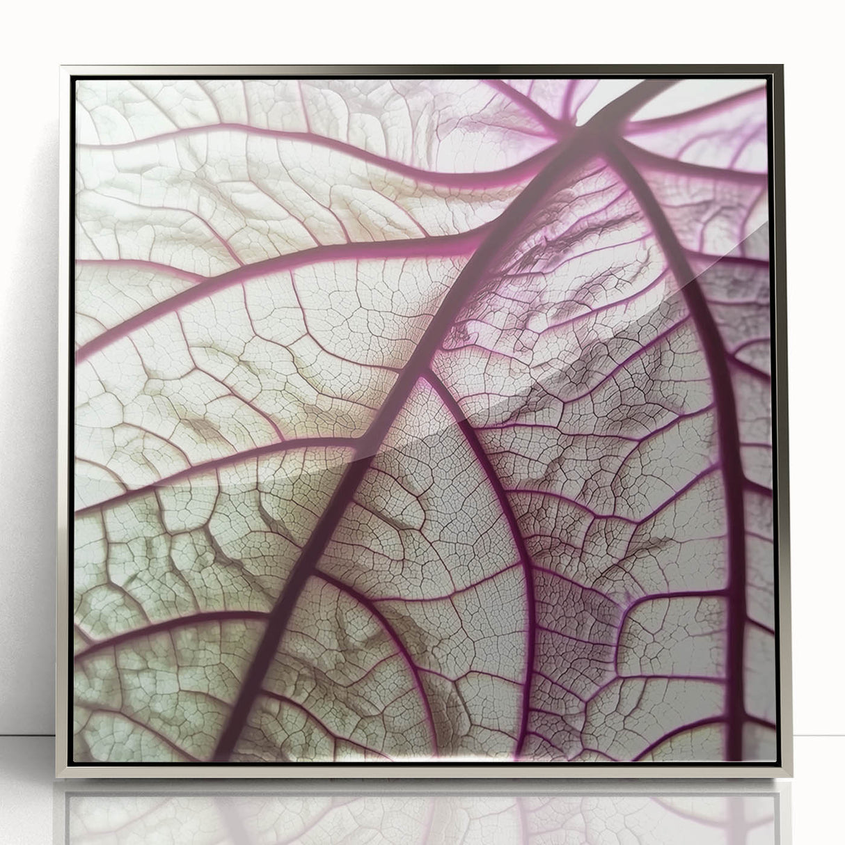Mid-century modernist art of close-up green leaves in a silver frame, suitable for nursery wall art.