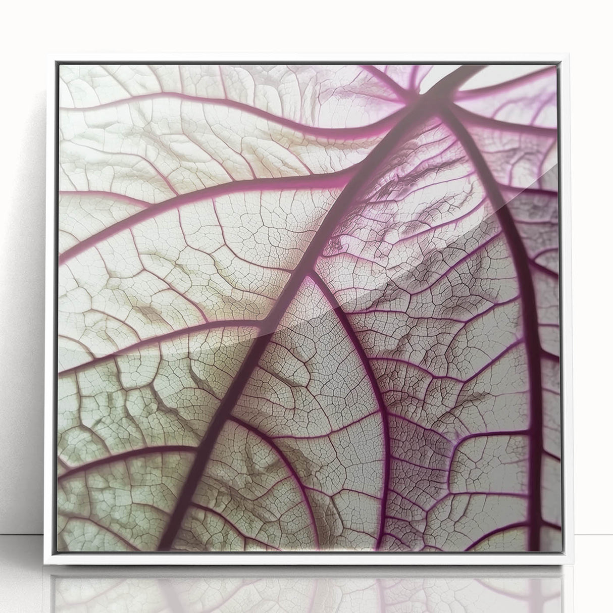 Close-up of green leaves portrayed in a modern art style on a white acrylic framed poster, suitable for nursery wall decor.