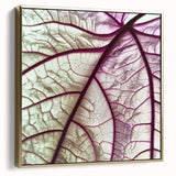 Framed canvas featuring close-up of leaves in silver and gold tones, ideal for bedroom wall art.