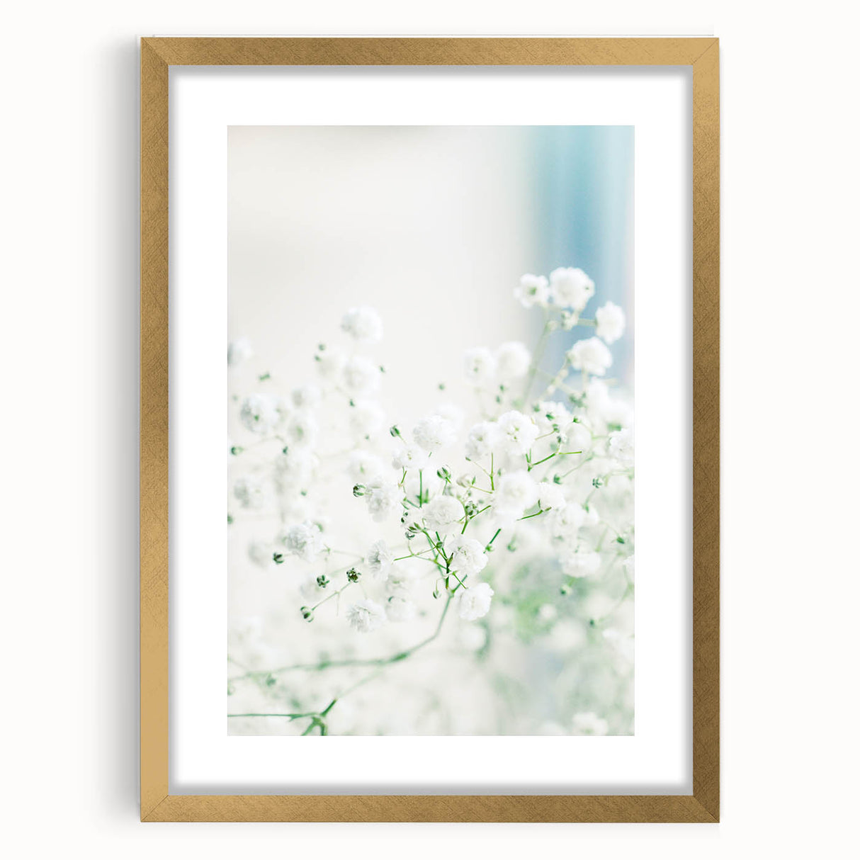 Extra large abstract art print depicting spring, with textured layers in soft green and yellow hues, framed in gold.