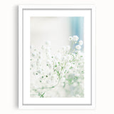 Abstract art print of spring theme in soft green and pink tones on a white framed canvas, ideal for dining room decor.