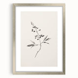 Textured abstract art print depicting a winter scene in muted blue and white tones, framed in silver.