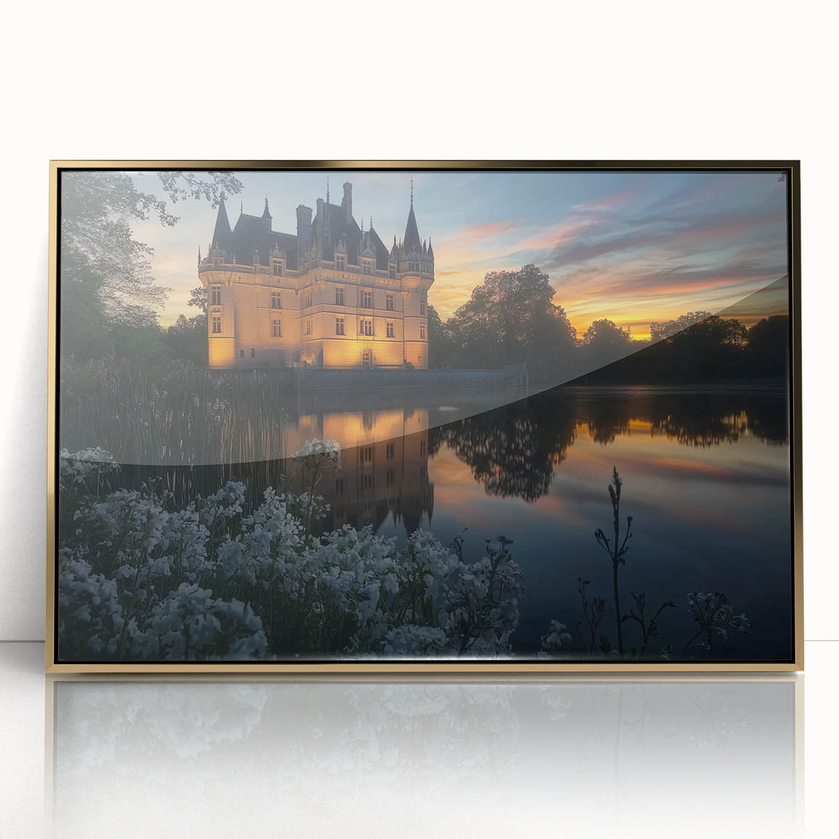 Framed acrylic artwork showcasing a picturesque landscape with a majestic castle, set in a gold frame, ideal for adding elegance to home decor.