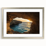Framed landscape art print featuring a serene cave scene, elegantly matted and finished with a sleek silver frame, ideal for enhancing modern home decor.