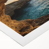 Rolled canvas artwork showcasing a vibrant landscape scene with cave formations and textured details, ideal for enhancing home decor. Packaged securely in a protective cardboard tube for safe delivery.