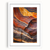 Framed landscape artwork showcasing dramatic cliffs against a serene sky, featuring a white mat for a polished presentation, ideal for home decor.