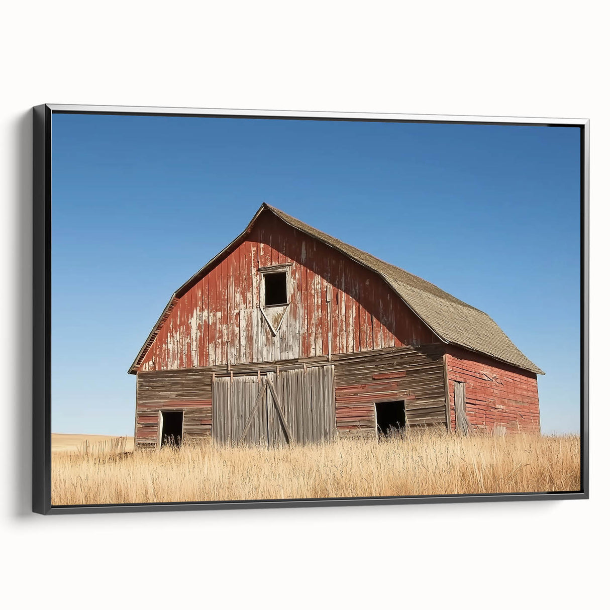 Landscape-oriented canvas print showcasing a barn design framed in black. The artwork features rustic colors and textures, perfect for home decor.