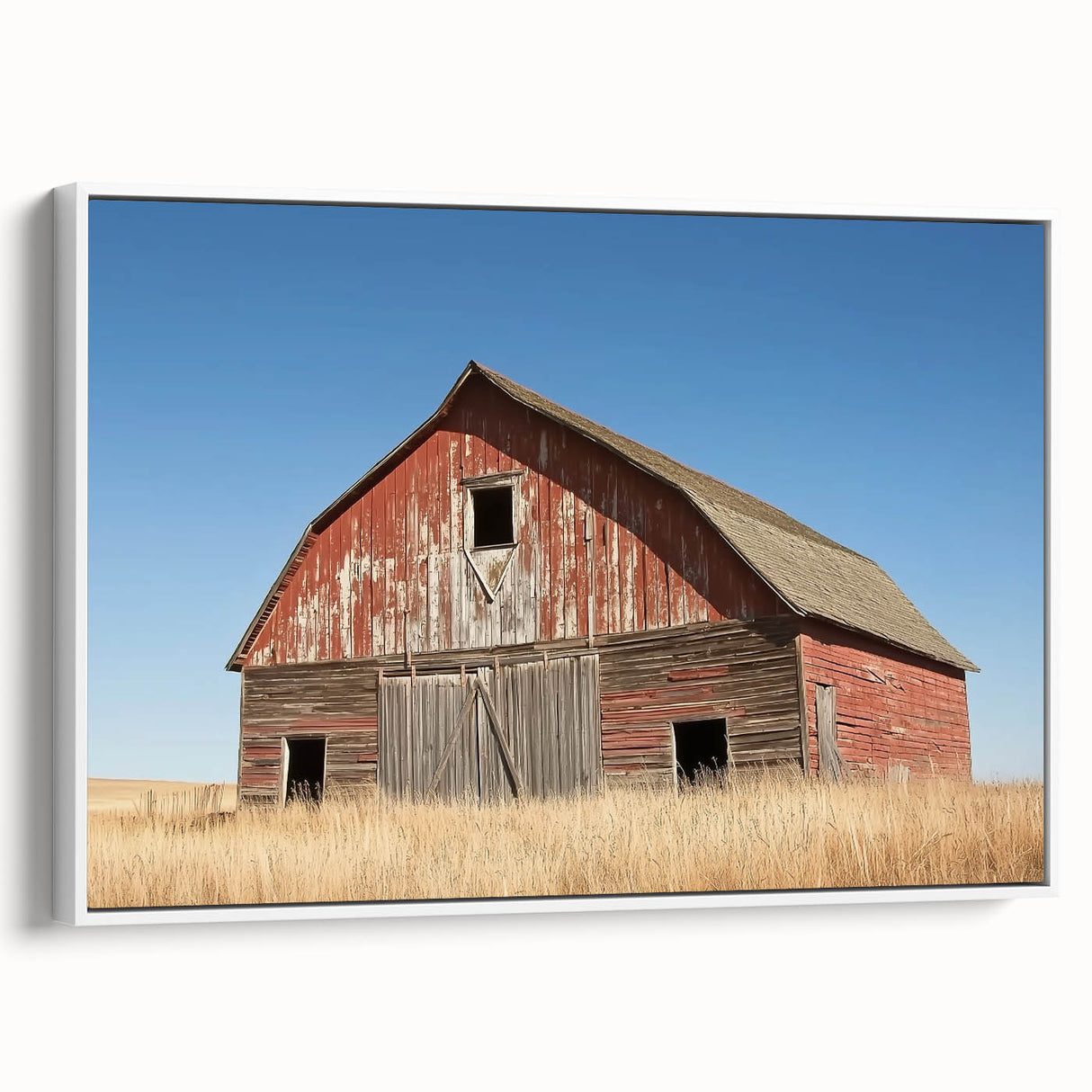 Elegant landscape barn-framed canvas artwork with a white finish, showcasing a serene countryside view. Ideal for home decor and enhancing rustic aesthetics.