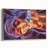 Framed canvas artwork showcasing a stunning landscape of canyons, featuring vibrant colors and intricate details, elegantly displayed with a sleek silver frame. Perfect for adding a touch of natural beauty to any room decor.