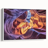 Framed landscape canvas print showcasing vibrant canyons in warm earth tones, displayed from a side view against a white background, perfect for home decor.