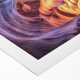 Vibrant rolled canvas artwork depicting majestic canyons under a sunset sky, showcasing rich colors and texture, ideal for home decor or art enthusiasts.