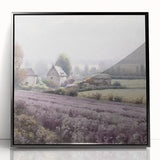 Framed acrylic wall art depicting a serene countryside landscape with lush greenery and rolling hills, showcased in a sleek black frame, perfect for home decor.
