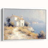 Framed canvas art showcasing a serene countryside landscape, featuring lush green fields, rolling hills, and a clear blue sky, presented in an elegant white frame.