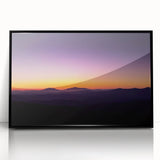 Framed acrylic artwork showcasing a vibrant desert landscape with striking colors, displayed from a front view against a minimalist black frame, ideal for modern decor.