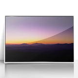 Framed acrylic artwork depicting a vibrant desert landscape, showcasing warm hues of orange and gold with a white border, perfect for modern home decor.