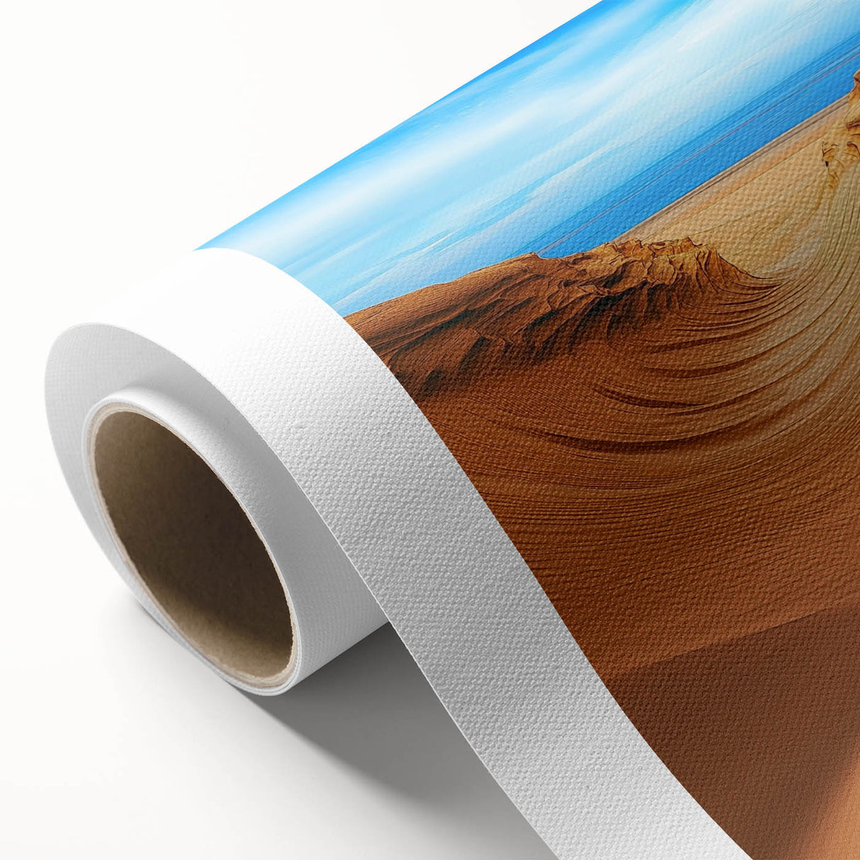 Rolled canvas depicting a serene desert landscape with rolling dunes under a vibrant sunset, showcasing warm hues and intricate textures, perfect for home decor.