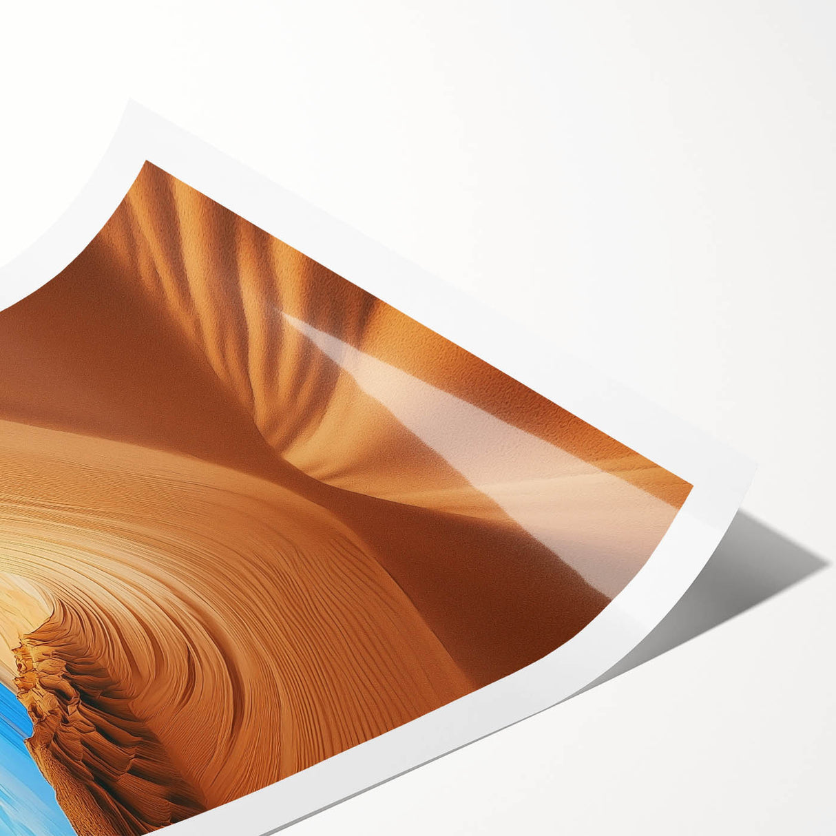 Desert landscape print showcasing rolling sand dunes under a vibrant sunset, rolled and packaged in a protective tube, ideal for home decor.