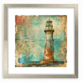 Silver-framed wall art depicting a serene lighthouse landscape, showcasing vibrant colors and intricate details, ideal for coastal-themed decor.