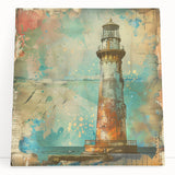Stretched canvas wall art depicting a serene lighthouse scene at sunset, showcasing vibrant colors and tranquil ocean waves, ideal for coastal home decor.