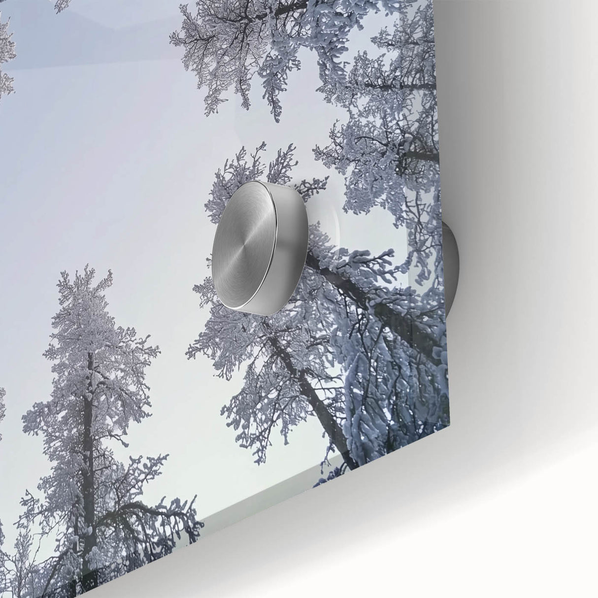 Large abstract wall art featuring icy textures in cool blue tones on acrylic glass, suitable for dining room ambiance.