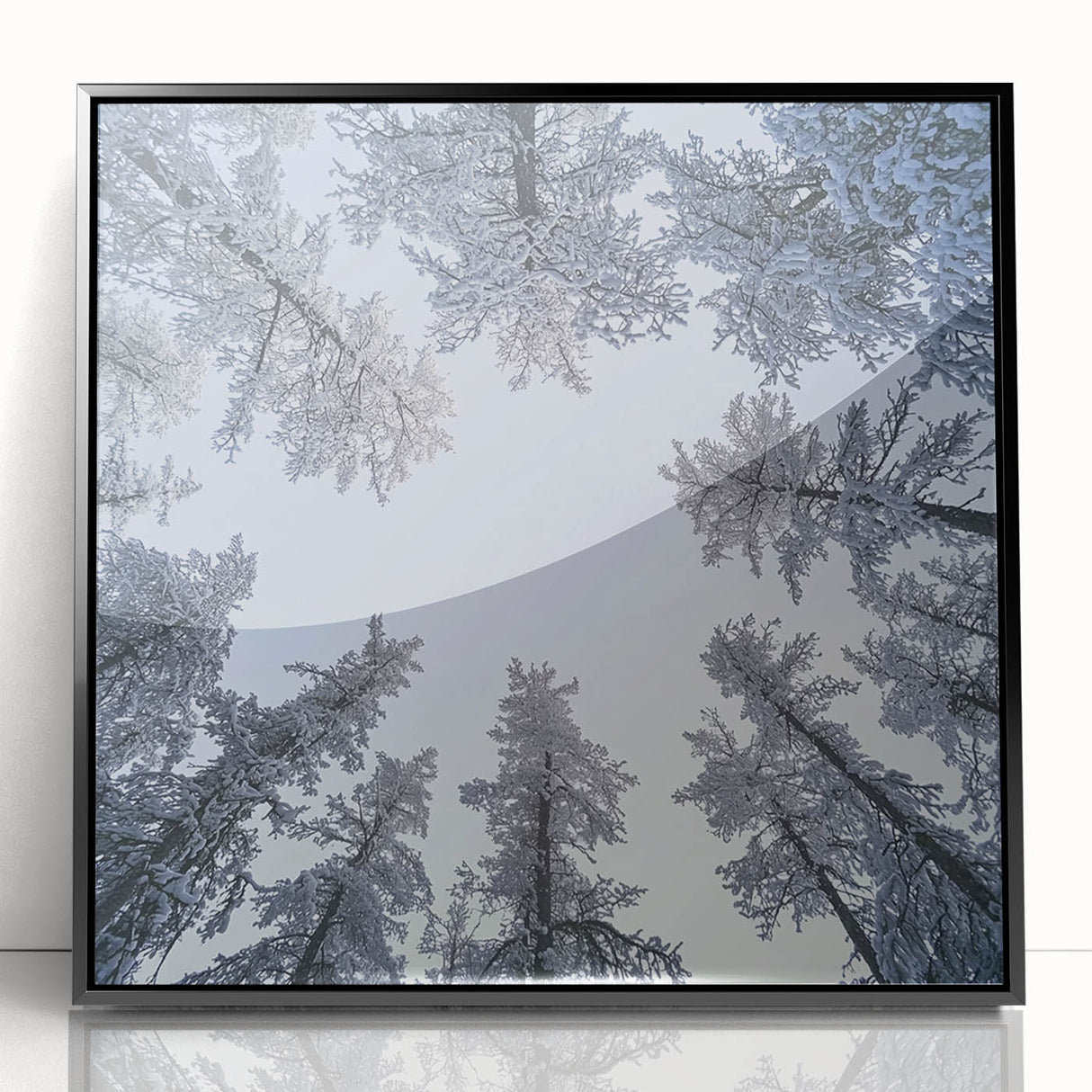 Large abstract wall art featuring icy textures and muted grays, framed in black acrylic.