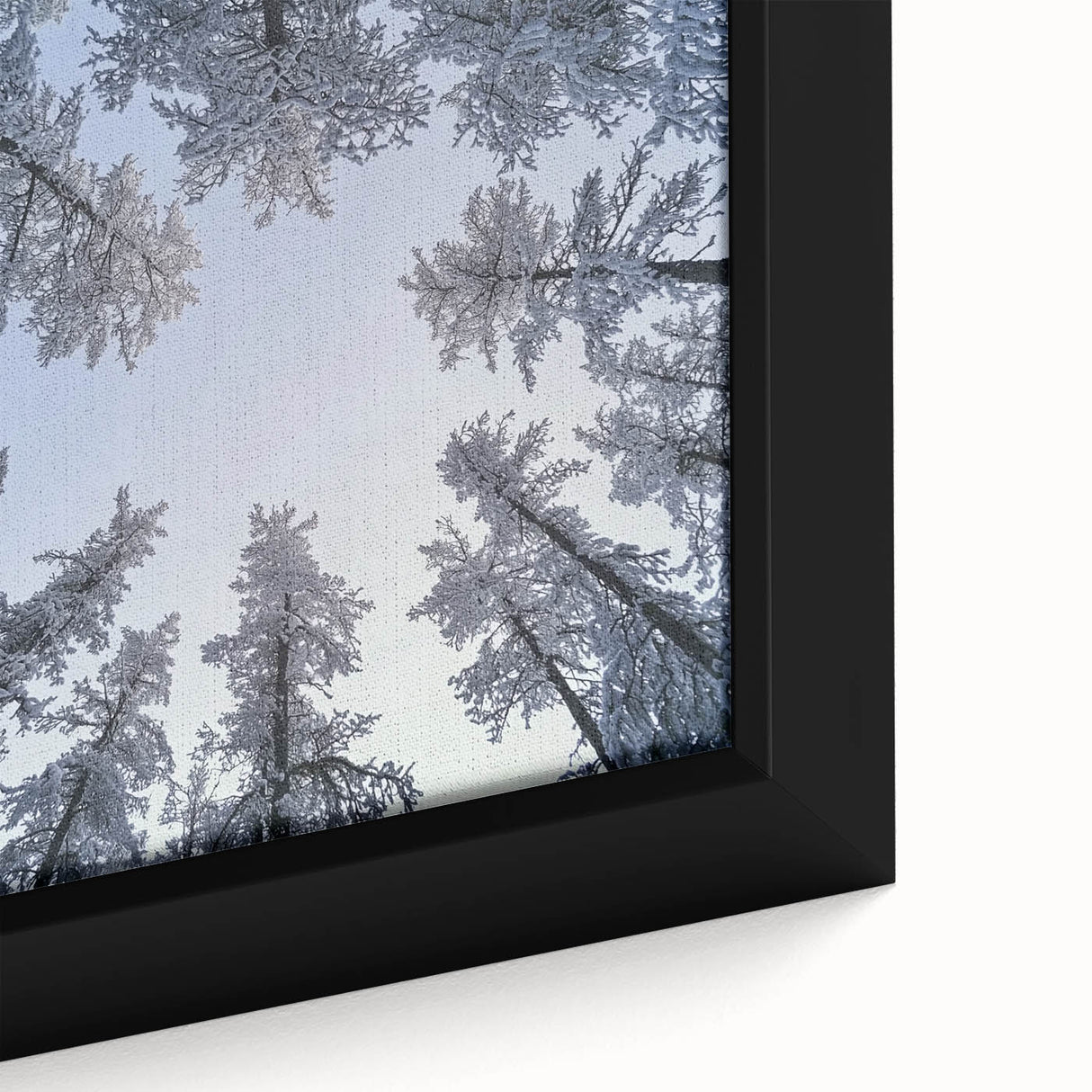 Close-up of black textured art depicting icicles and frost on canvas, with vibrant colors, ideal for living room decor.