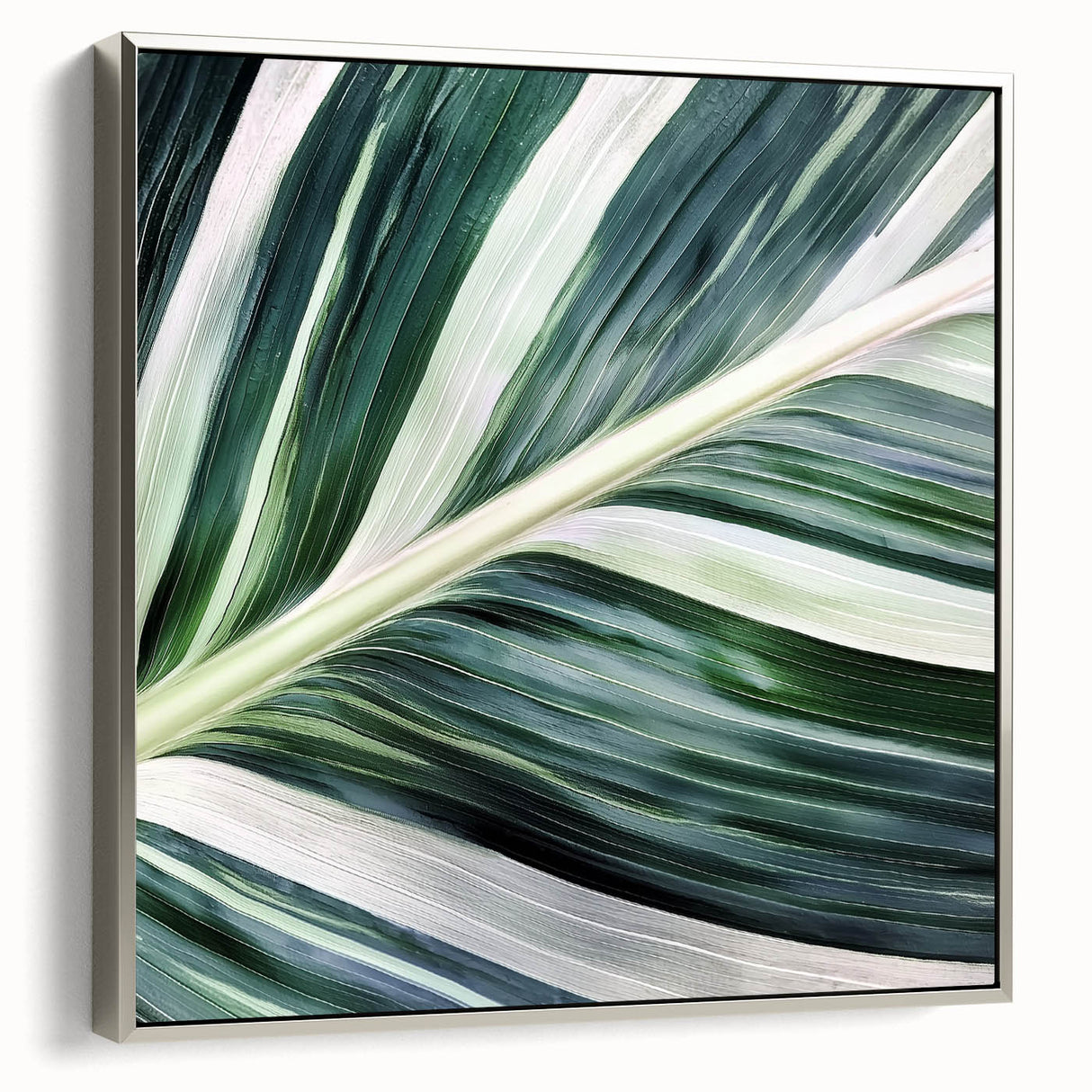 Close-up landscape art painting of leaves, rendered in vibrant green and silver tones on a framed canvas.