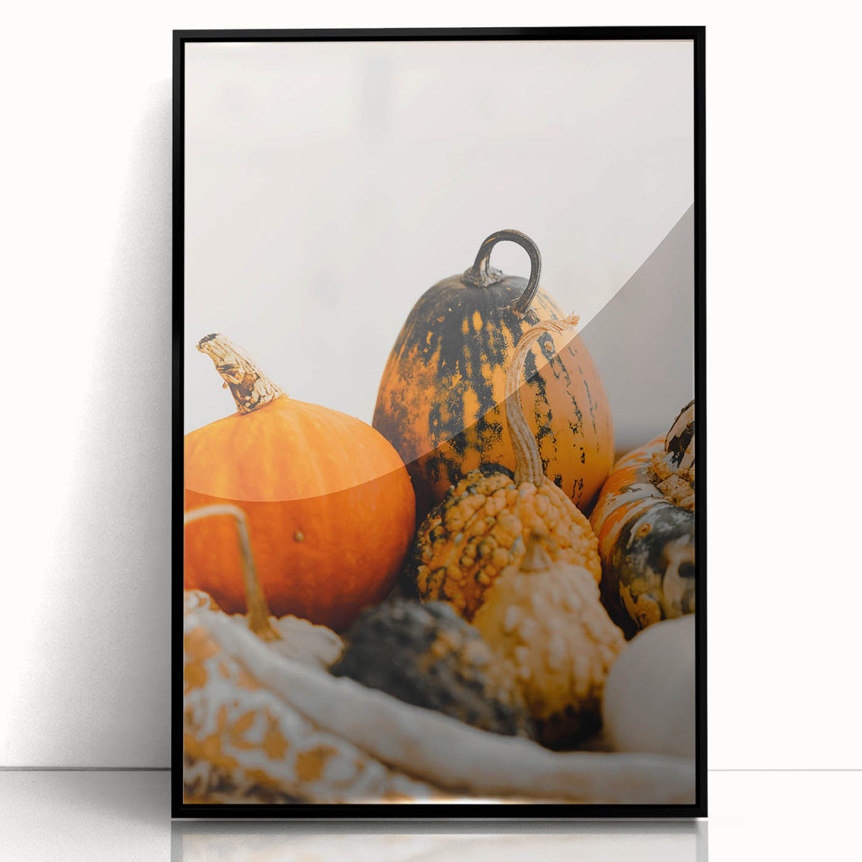 Large abstract wall art featuring swirling autumnal colors on a framed acrylic, ideal for modern living room decor.