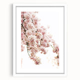 Abstract art print depicting spring season in pastel shades, framed in white, suitable for bedroom or dining room decor.