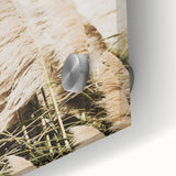 Large abstract wall art in vibrant orange and yellow tones on acrylic glass, ideal for dining room ambiance.