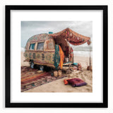 Extra large abstract art print featuring a colorful textured caravan, in a black frame with mat, ideal for living room decor.