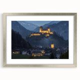 Elegant silver-framed landscape artwork showcasing a majestic castle surrounded by lush greenery, with a white mat highlighting the piece's intricate details. Perfect for enhancing home decor with a touch of sophistication.